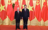 Tổng Bí thư Nguyễn Phú Trọng và Tổng Bí thư, Chủ tịch Trung Quốc Tập Cận Bình trao đổi Thư chúc mừng năm mới